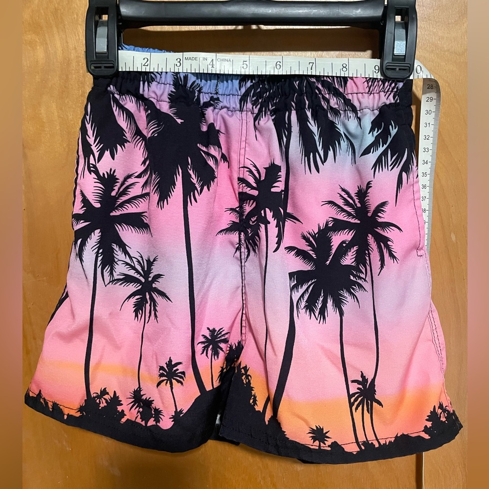 Boys tropical swim trunks size M